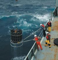 Repeat hydrography CTD deployment over side of ship