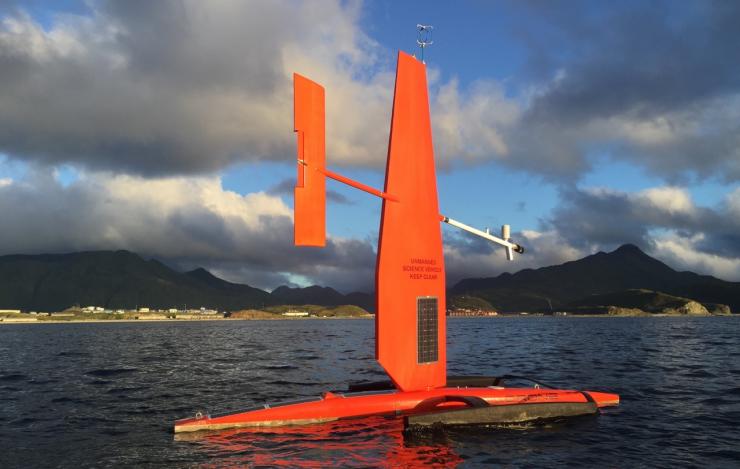 A Saildrone departs Dutch Harbor, AK in 2016 on it's way to test sensors on this platform for multi-disciplinary science