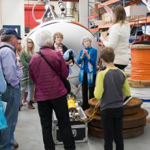Tour group learning more about moored buoys at the 2017 Open House. 